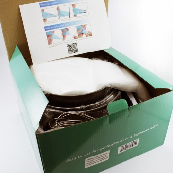 Предмети з набору розміщені в картонній коробці-3